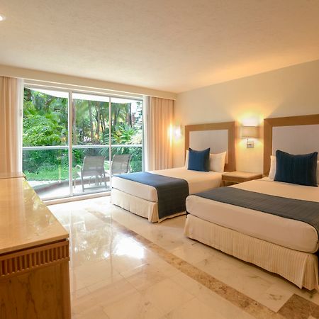 Grand Park Royal Cozumel Exterior foto Junior Suite